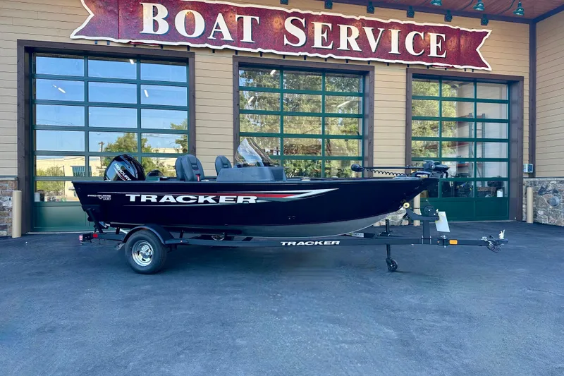 The Image of 2026 Tracker Pro Guide V-16 SC boat outside service center. - 0