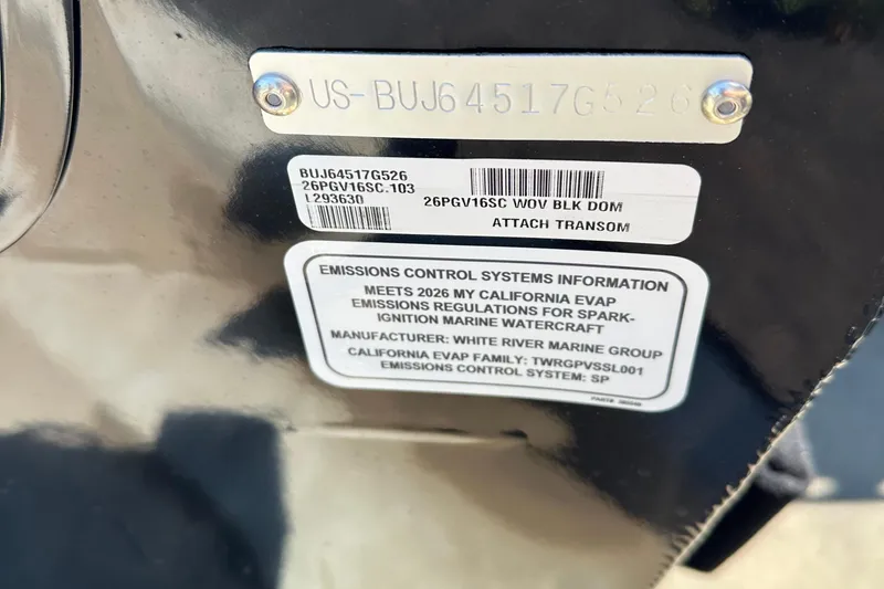 Slide: The Image of 2026 Tracker Pro Guide V-16 SC emissions control label and serial number plate. - 79