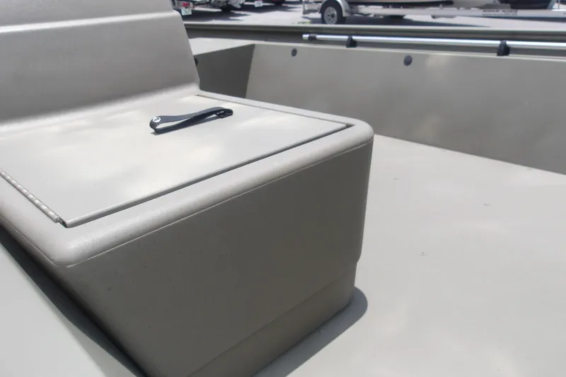 Slide: The Image of 2026 Tracker Grizzly 1648 SC boat interior with storage compartment and handle. - 12