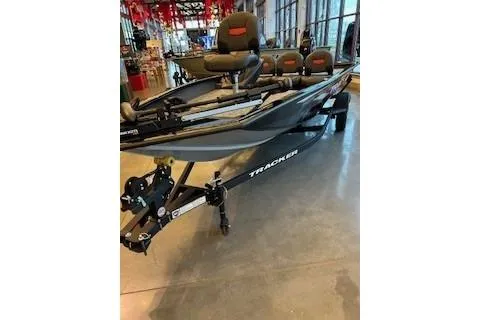 Slide: The Image of 2026 Tracker Pro Team 175 Crappie Edition boat displayed indoors. - 6