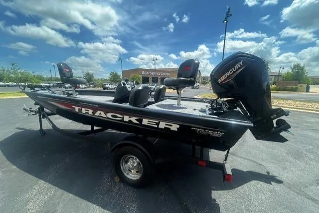 The Image of 2026 Tracker Pro Team 175 Crappie Edition boat with Mercury engine, parked outdoors. - 0