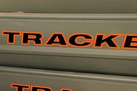 The Image of 2026 Tracker Grizzly 12 Jon boat with bold orange lettering. - 0