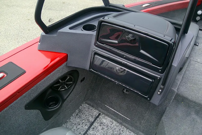 Slide: The Image of Interior of 2026 Tracker Targa V-18 Combo boat with storage compartments and speaker. - 11