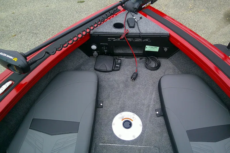 Slide: The Image of 2026 Tracker Targa V-18 Combo boat interior with Minn Kota trolling motor and seating. - 13