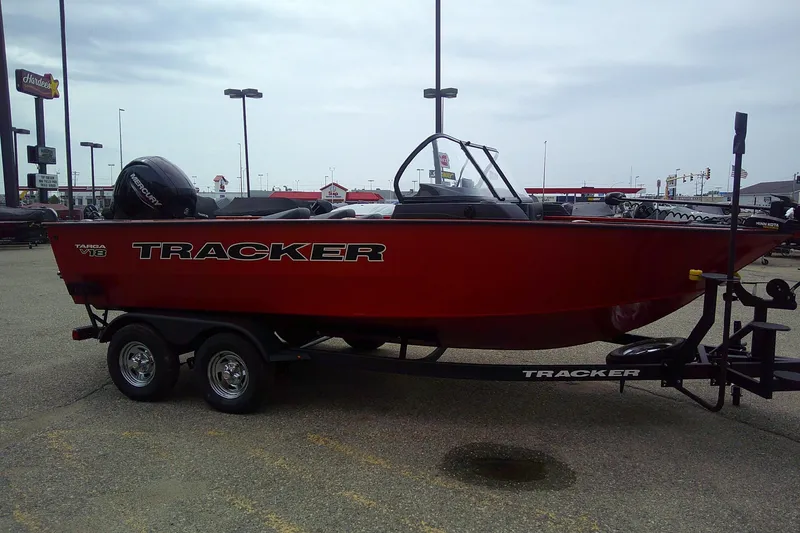 Slide: The Image of 2026 Tracker Targa V-18 Combo boat on trailer in parking lot. - 3
