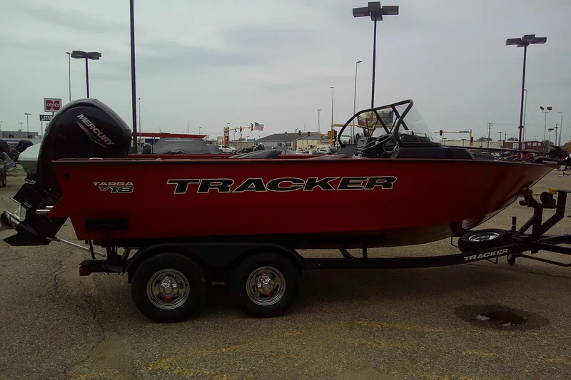 Slide: The Image of 2026 Tracker Targa V-18 Combo boat on trailer in parking lot. - 5