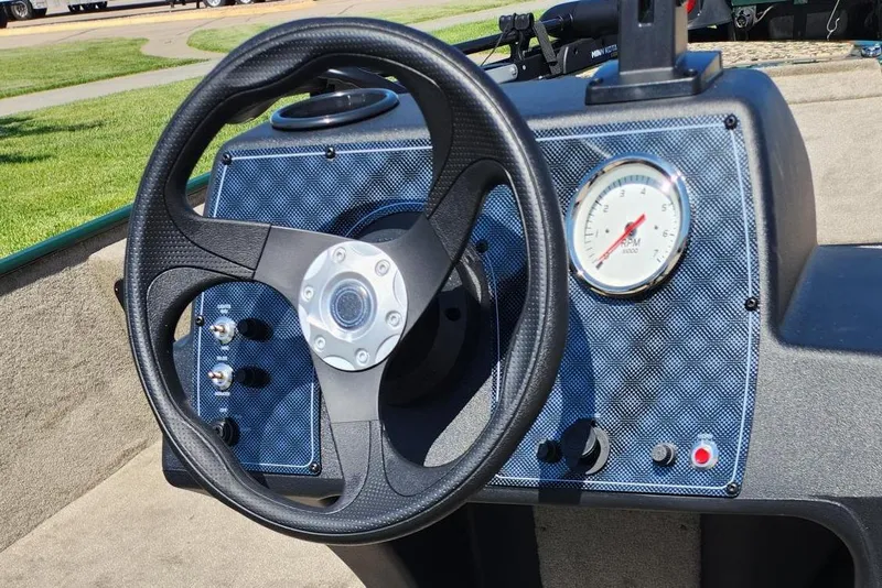 Slide: The Image of Steering wheel and dashboard of 2026 Tracker Bass Tracker Classic Limited boat. - 6