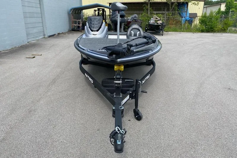 Slide: The Image of 2026 Nitro Z17 boat on trailer in outdoor storage area. - 96