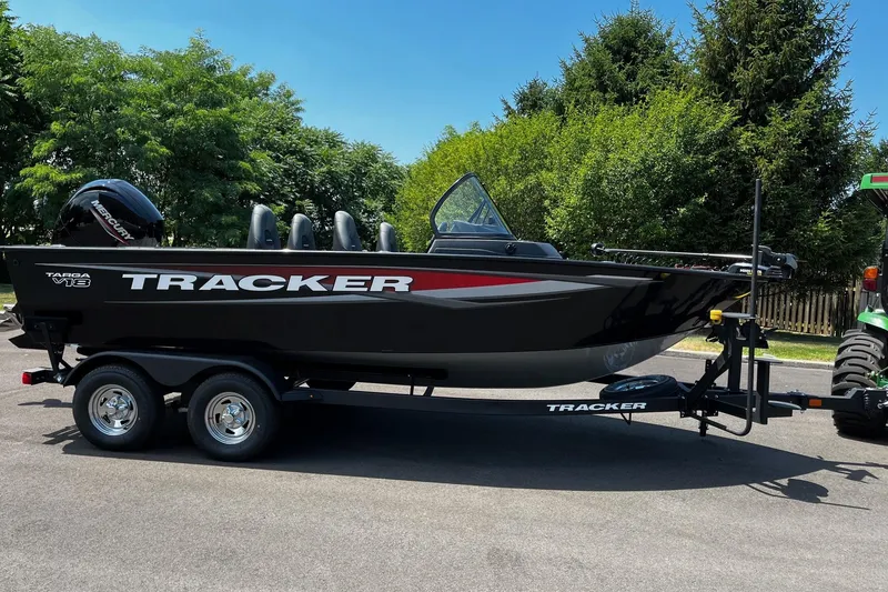 The Image of 2026 Tracker Targa V-18 WT boat on trailer, parked outdoors. - 0