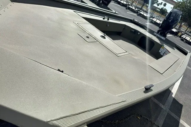 Slide: The Image of 2026 Tracker Grizzly 1654 T Sportsman boat, showcasing sleek design and durable construction. - 12