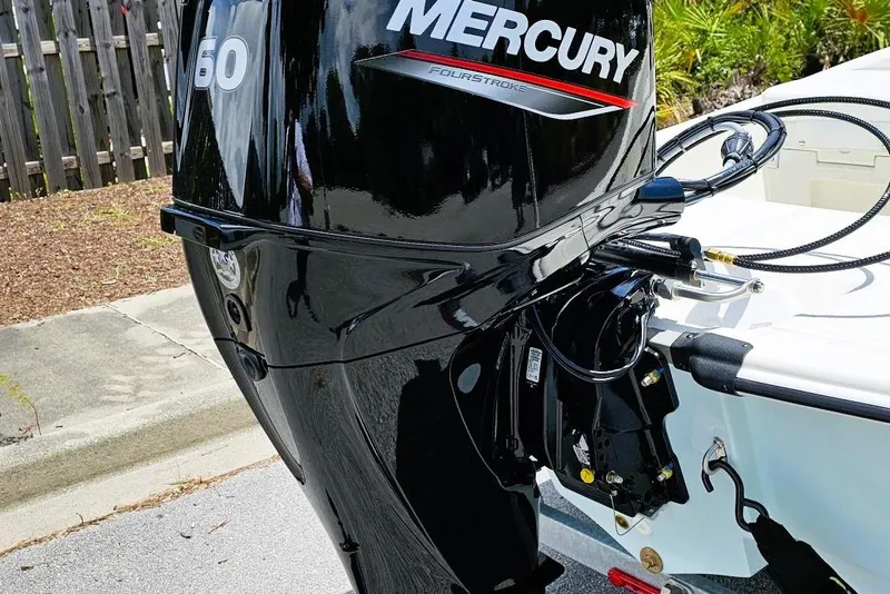 Slide: The Image of 2026 Mako Pro Skiff 15 CC with Mercury 60 FourStroke outboard engine. - 5