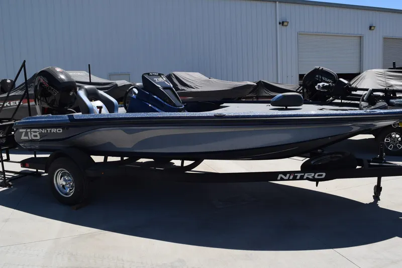Slide: The Image of 2026 Nitro Z18 Pro fishing boat on trailer, featuring Garmin equipment. - 1