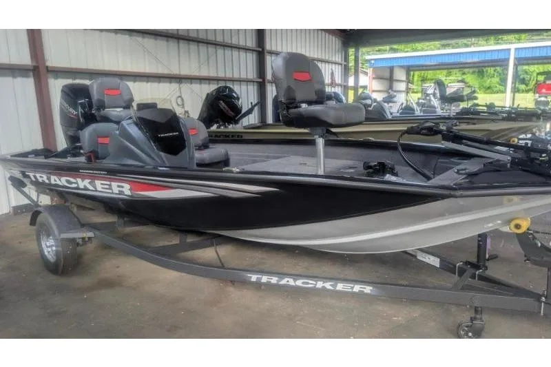 Slide: The Image of 2026 Tracker Pro Team 175 Crappie Edition fishing boat in storage facility. - 10