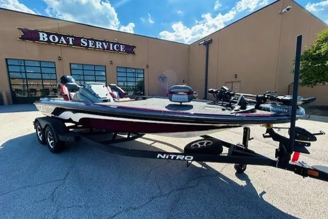 The Image of 2026 Nitro Z20 XL Pro boat on trailer outside boat service center. - 0