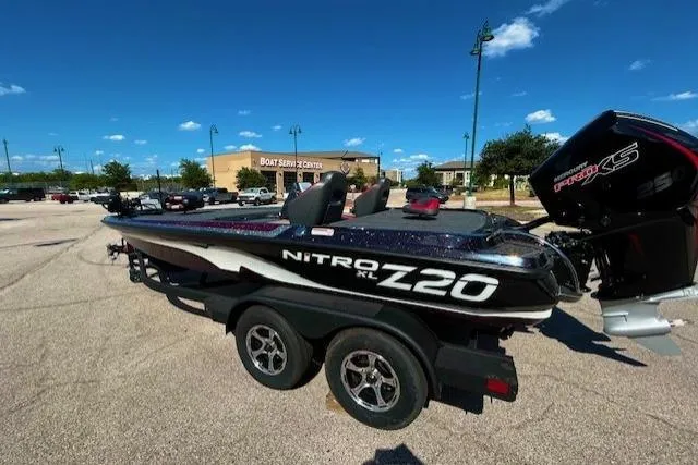 Slide: The Image of 2026 Nitro Z20 XL Pro boat on trailer in parking lot, sunny day. - 3