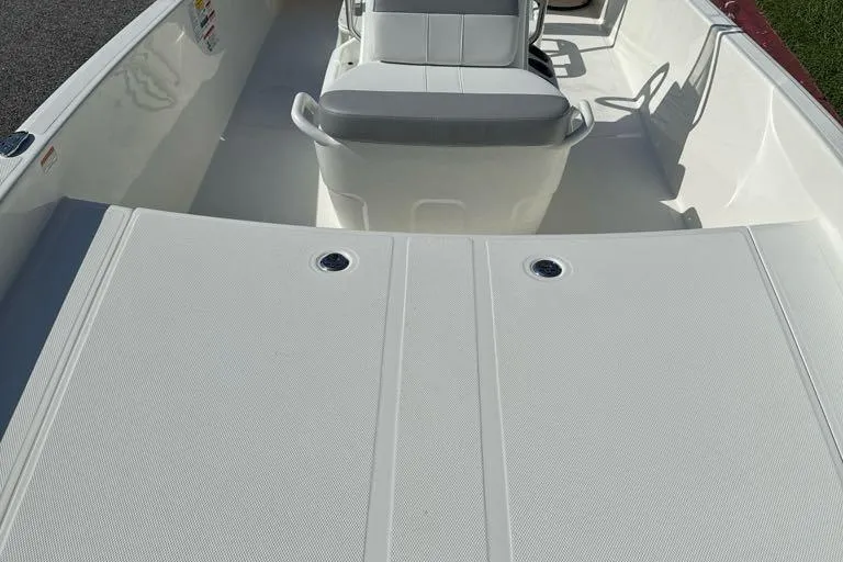 Slide: The Image of 2026 Mako Pro Skiff 17 CC interior, featuring spacious seating and clean deck design. - 4