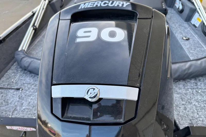 Slide: The Image of 2026 Tracker Pro Guide V-16 SC with Mercury 90 engine, close-up view. - 76