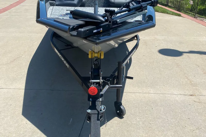 Slide: The Image of 2026 Tracker Pro Team 175 Crappie Edition boat on trailer, outdoor setting. - 2