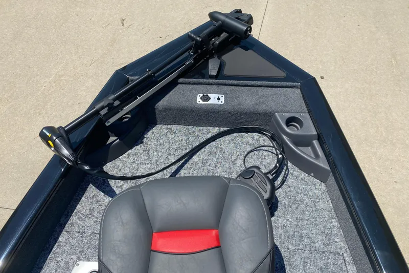 Slide: The Image of 2026 Tracker Pro Team 175 Crappie Edition boat interior with trolling motor and seating. - 3