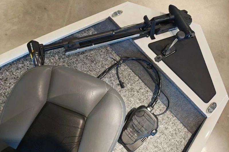 Slide: The Image of 2026 Tracker Pro 170 boat interior with seat and trolling motor. - 8