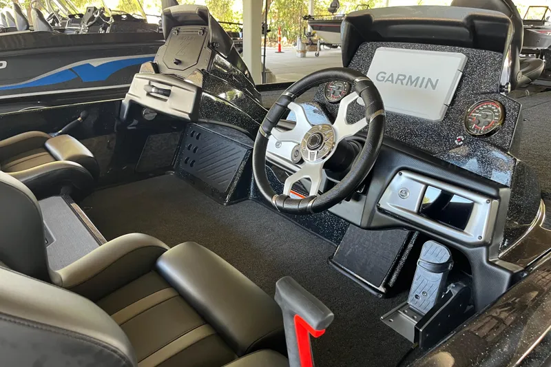 Slide: The Image of Interior of 2026 Nitro Z20 XL Pro boat with Garmin navigation system and sleek design. - 6