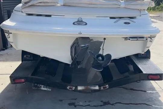 Slide: The Image of Rear view of a 2001 Harris-Kayot Star 20V boat on a trailer. - 4