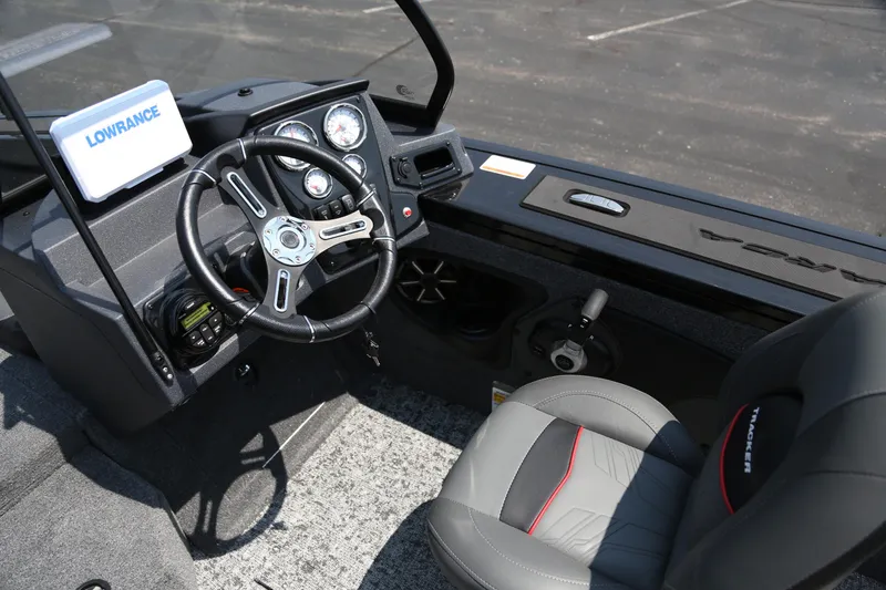 Slide: The Image of Interior of 2026 Tracker Targa V-18 Combo boat with steering wheel and dashboard. - 4