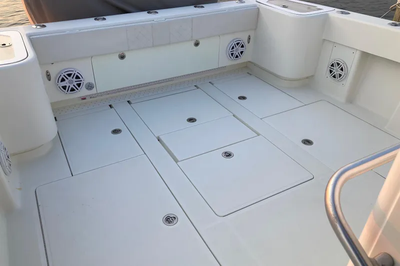 Slide: The Image of 2017 SeaVee 370z boat deck with storage compartments and speakers. - 3