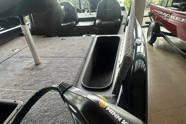 Slide: The Image of 2026 Tracker Pro Team 175 boat interior with Minn Kota trolling motor. - 8