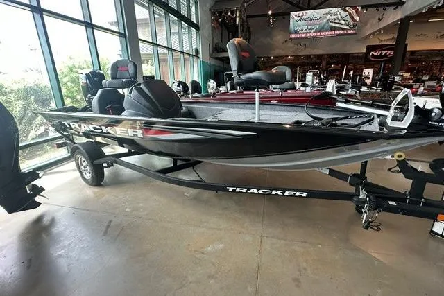 The Image of 2026 Tracker Pro Team 175 boat displayed indoors on a trailer. - 0