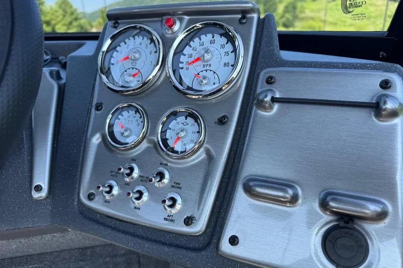 Slide: The Image of Dashboard of 2026 Tracker Pro Guide V-175 WT boat with gauges and controls. - 8