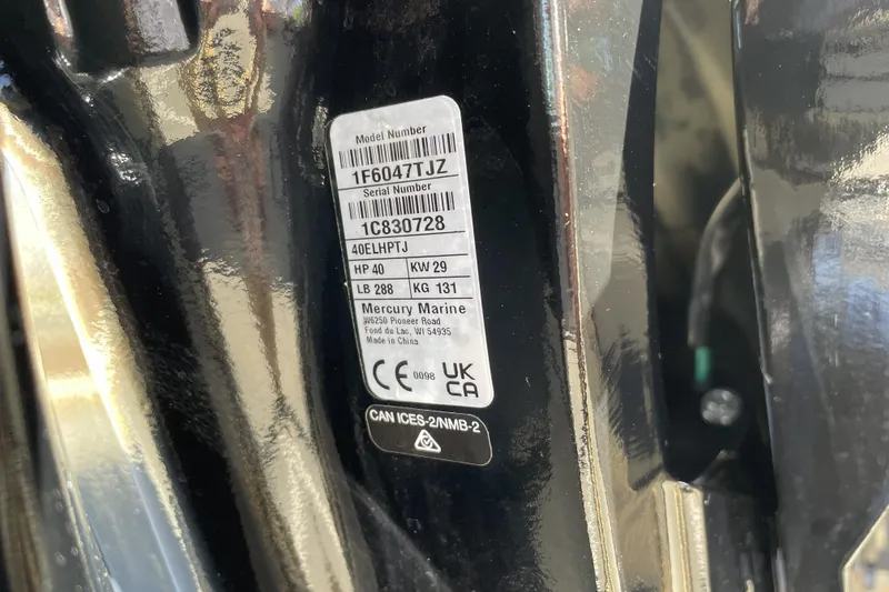 Slide: The Image of Label on 2026 Tracker Grizzly 2072 Utility, displaying model and serial numbers. - 25