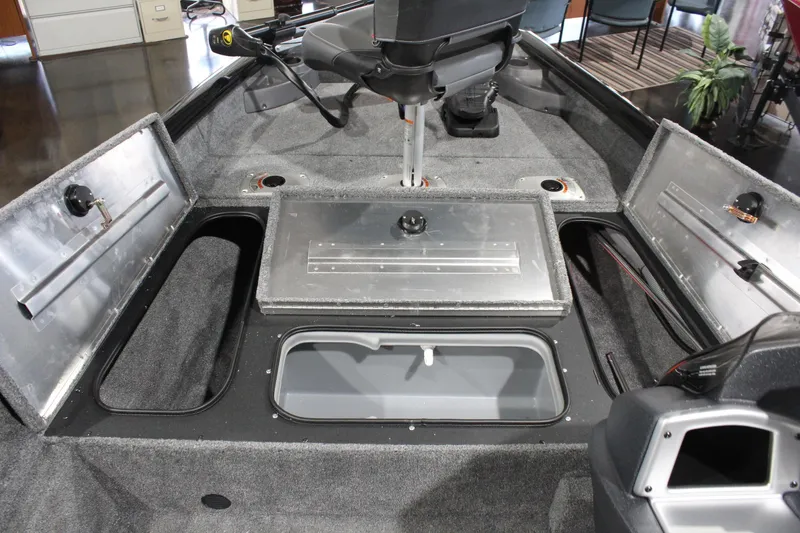 Slide: The Image of 2026 Tracker Pro Team 175 Crappie Edition boat interior with storage compartments open. - 11