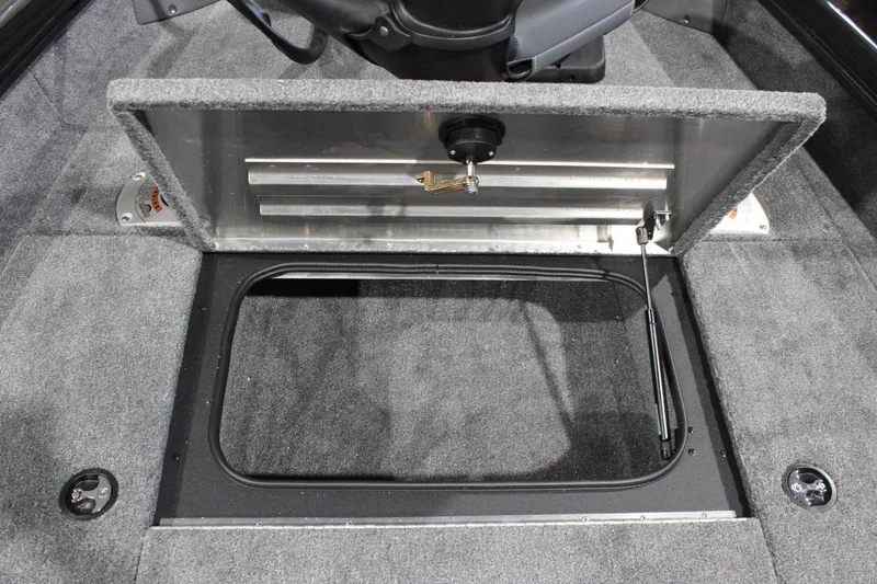 Slide: The Image of 2026 Tracker Pro Team 175 Crappie Edition boat storage compartment with open lid. - 12