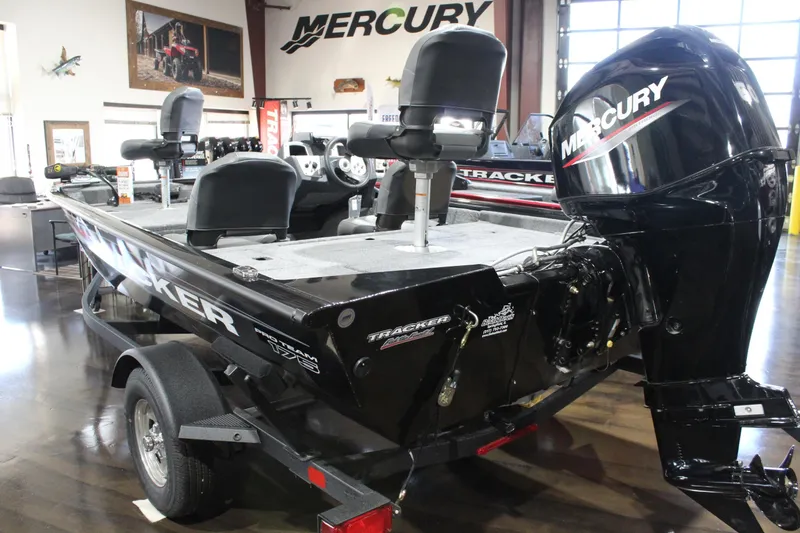 Slide: The Image of 2026 Tracker Pro Team 175 Crappie Edition boat with Mercury engine in showroom. - 4