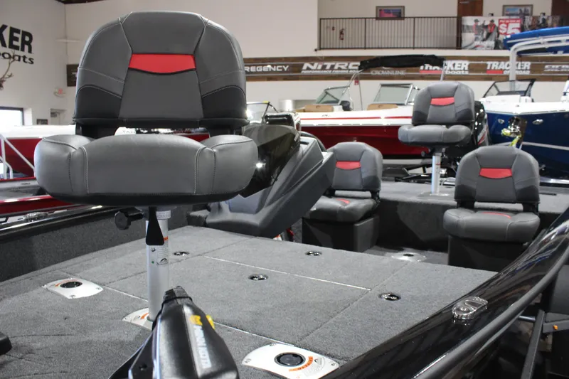 Slide: The Image of 2026 Tracker Pro Team 175 Crappie Edition boat interior with gray and red seating. - 5