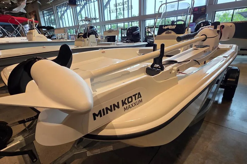 The Image of 2026 Mako Pro Skiff 15 CC with Minn Kota Maxxum motor in showroom. - 0