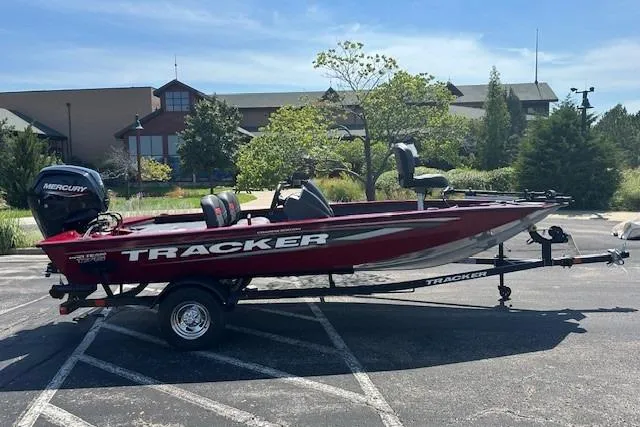The Image of 2026 Tracker Pro Team 175 Crappie Edition boat on trailer, parked outdoors. - 0