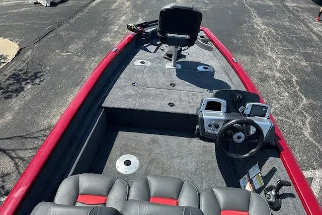Slide: The Image of 2026 Tracker Pro Team 175 Crappie Edition boat with red trim and seating. - 4