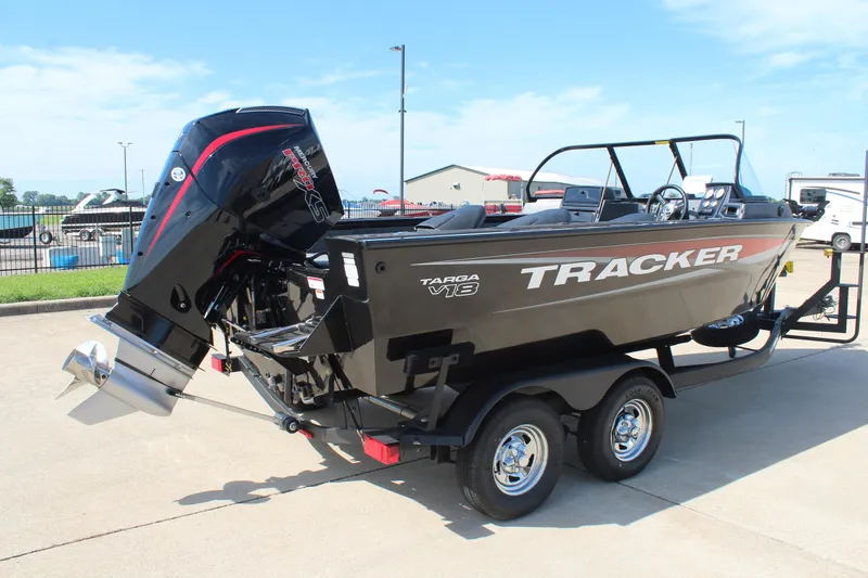 Slide: The Image of 2026 Tracker Targa V-18 Combo boat on trailer, featuring powerful outboard motor. - 3