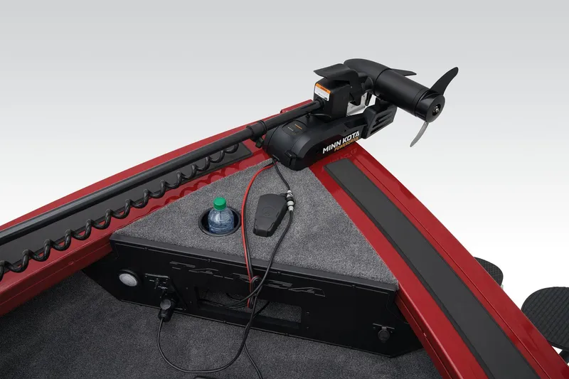 Slide: The Image of 2026 Tracker Targa V-18 Combo boat interior with steering console and seating. - 13