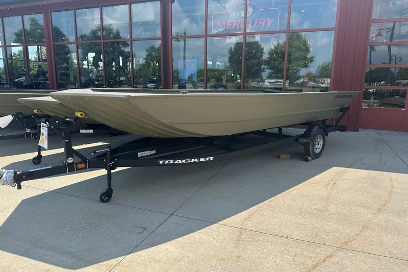 The Image of 2026 Tracker GRIZZLY 2072 Utility boat on trailer outside dealership. - 0