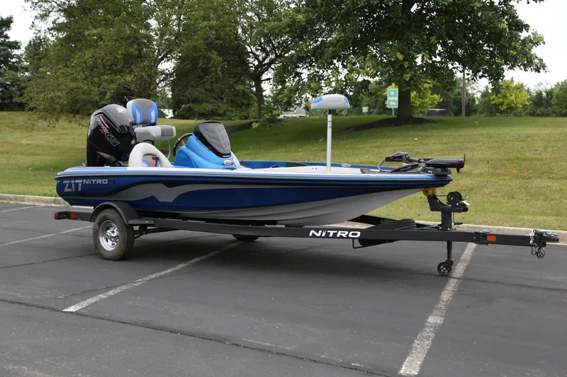 The Image of 2026 Nitro Z17 boat on trailer in parking lot, side view. - 0