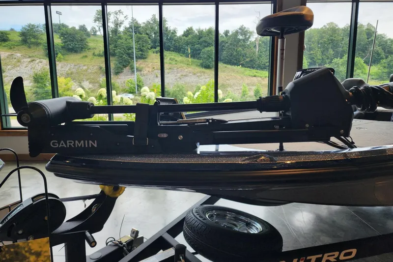 Slide: The Image of Nitro Z18 Pro 2026 boat with Garmin trolling motor, indoor display, scenic window view. - 3