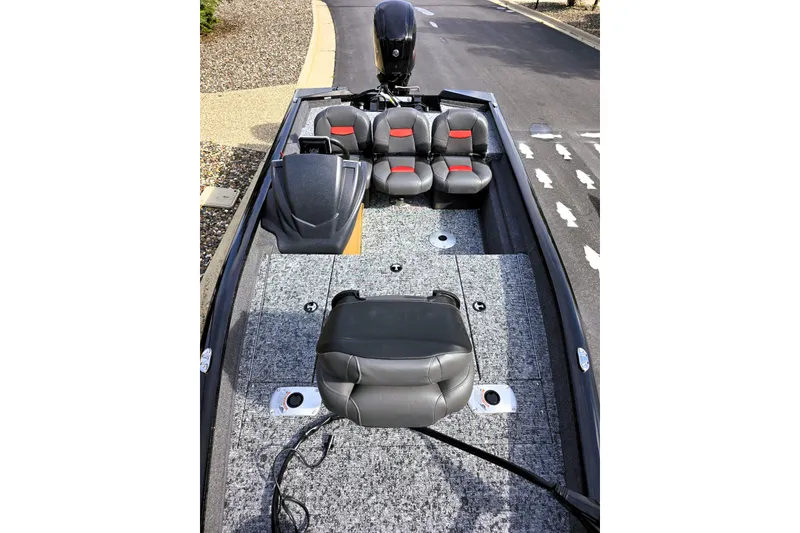 Slide: The Image of 2026 Tracker Pro Team 175 Crappie Edition boat interior with seating and carpeted deck. - 4