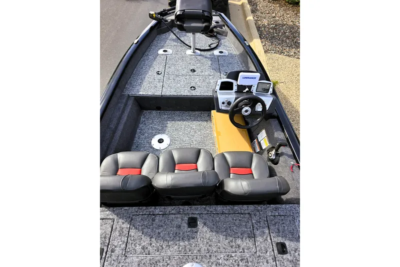 Slide: The Image of 2026 Tracker Pro Team 175 Crappie Edition boat interior with seating and control panel. - 5