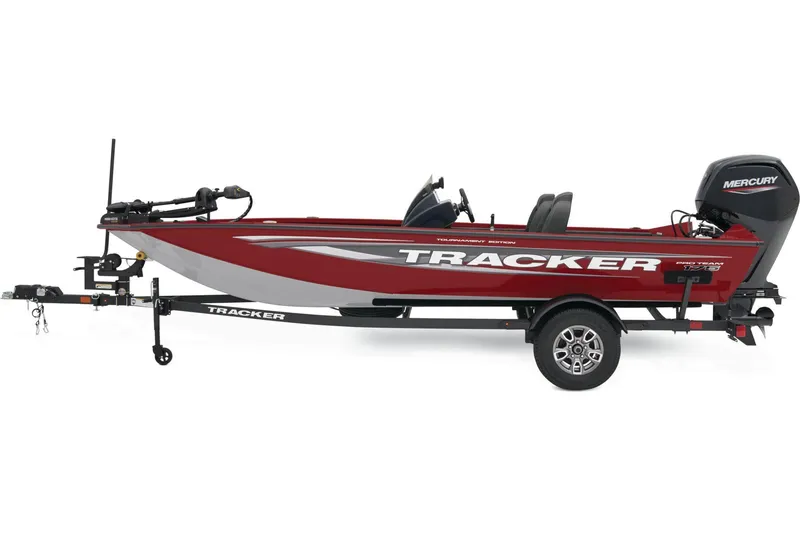 Slide: The Image of 2026 Tracker Pro Team 175 boat displayed in showroom with Mercury engine. - 4
