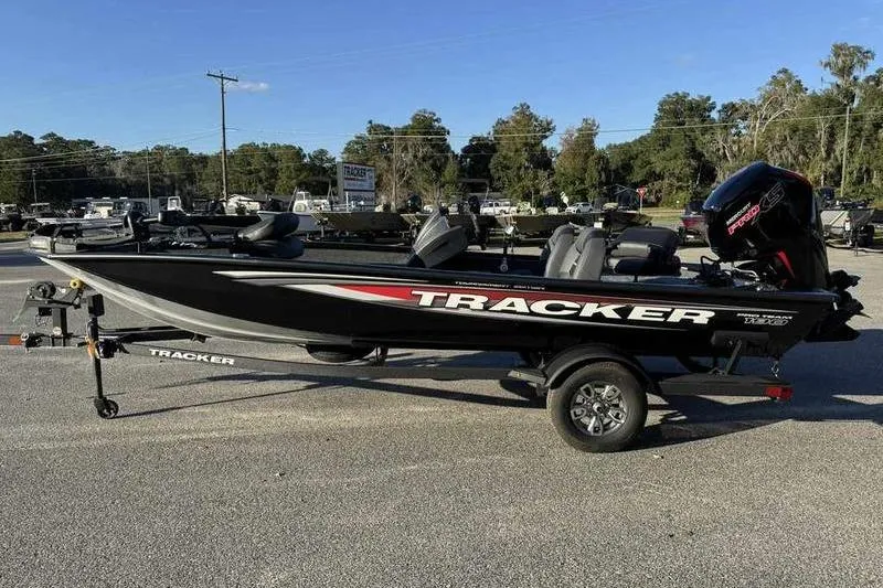 The Image of 2026 Tracker Pro Team 190 boat on trailer, parked outdoors under clear sky. - 3