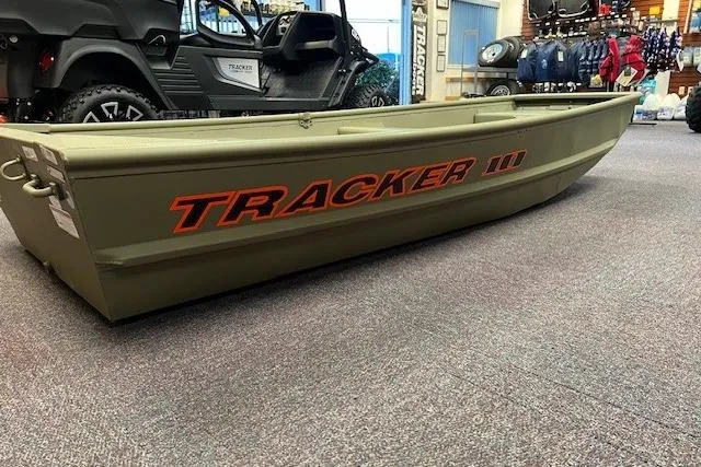 The Image of 2026 Tracker Grizzly 10 Jon boat displayed in a showroom. - 0