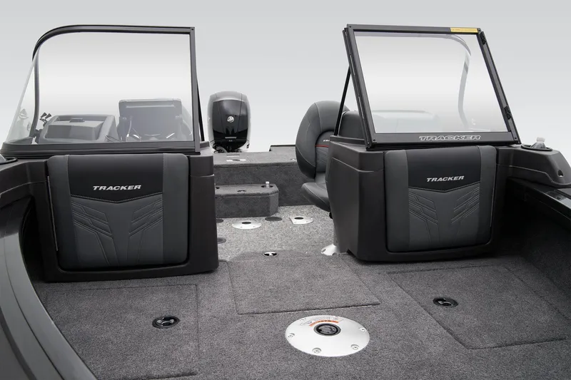 Slide: The Image of 2026 Tracker Targa V-18 WT boat seats with sleek gray upholstery and red accents. - 21
